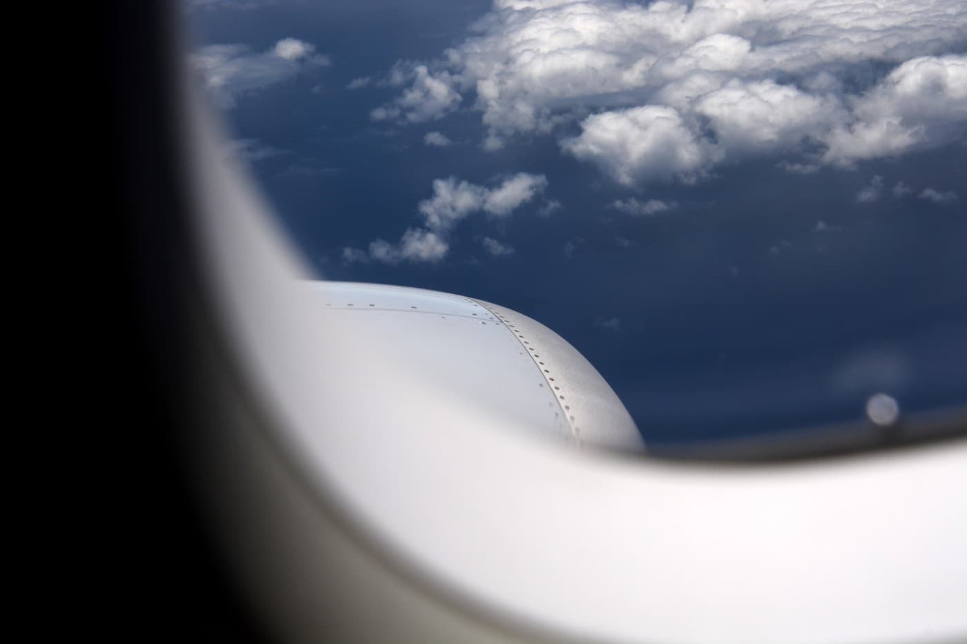 What's the tiny hole in the airplane window for?